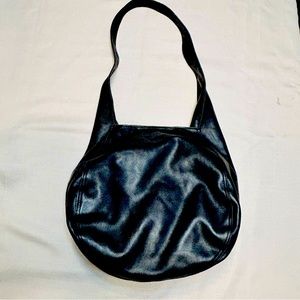 Micheal Kohrs black leather shoulder bag